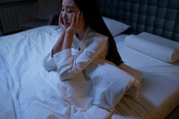 woman having trouble sleeping